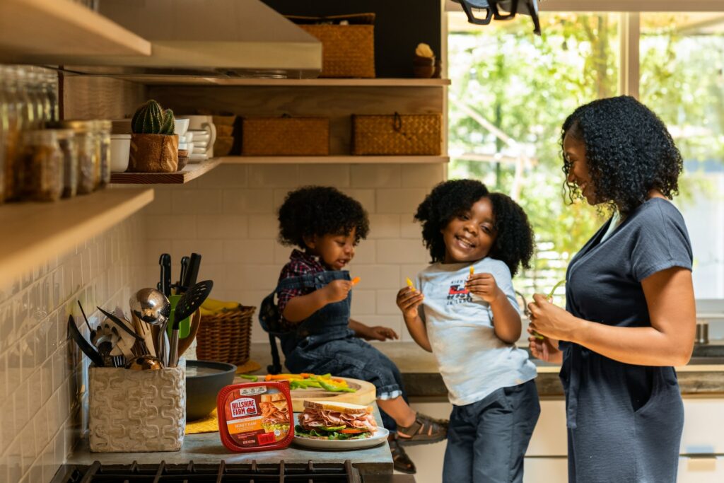 mom with kids in kitchen